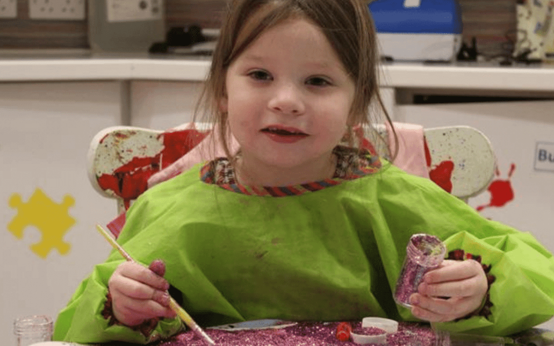 ella playing at HDH with glitter_1500x700