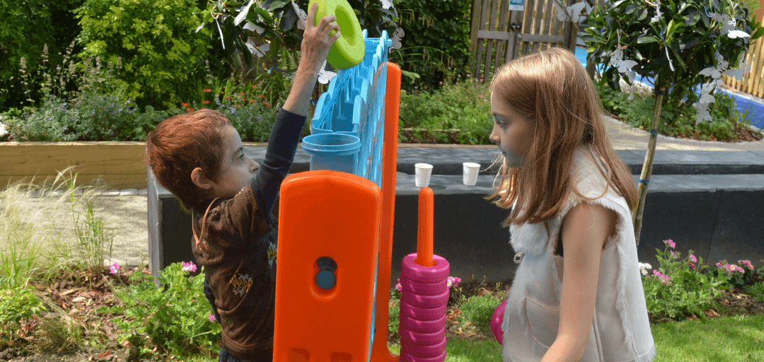 finley and sister lucie in HDH garden_1200x500
