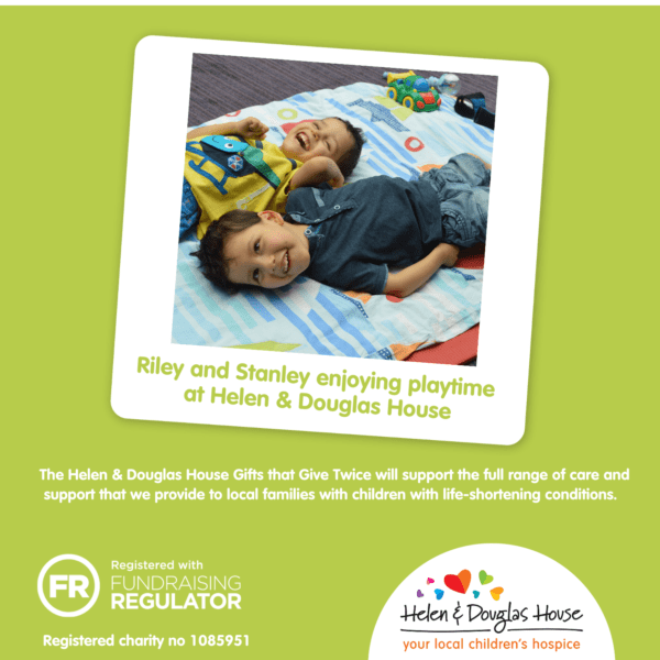 A graphic showing two lying down boys laughing and smiling