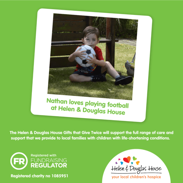 A graphic showing a boy sitting on the grass with a ball