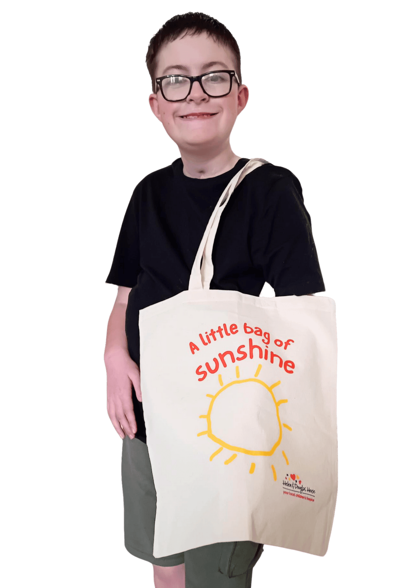 Nathan cut out tote bag Nathan wearing a cream tote bag with a yellow sunshine drawn on it and the words A little bag of sunshine.