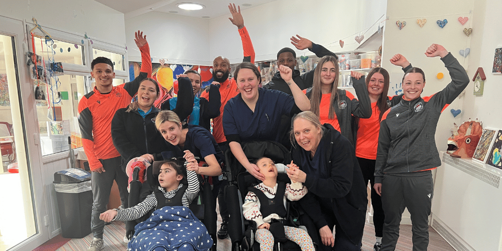 Oxford City FC visit to the hospice with children and nurses
